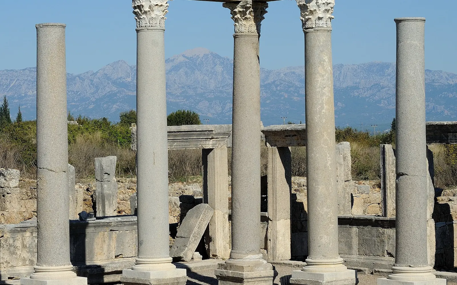 A Roman column at Perge under a rainbow